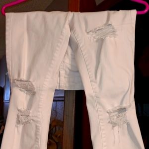 Woman's white cut up like new jeans